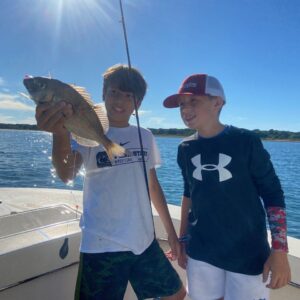 2 boys porgy fishing caught one fish